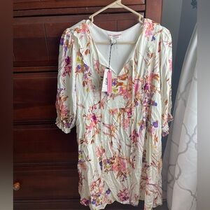 Brand new dress but is no longer needed, adorable for Summer or Spring!